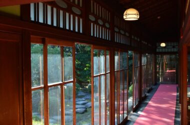 hallway of traditional japanese building opening to garden