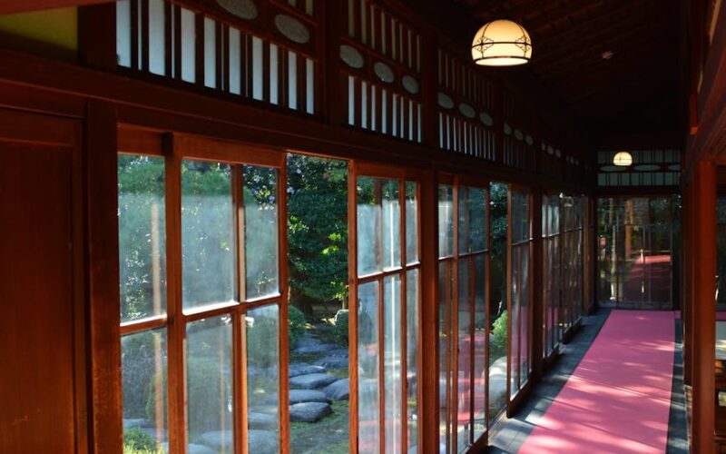 hallway of traditional japanese building opening to garden