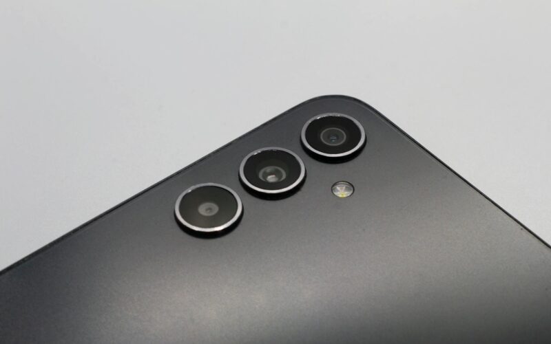 modern smartphone triple camera close up shot